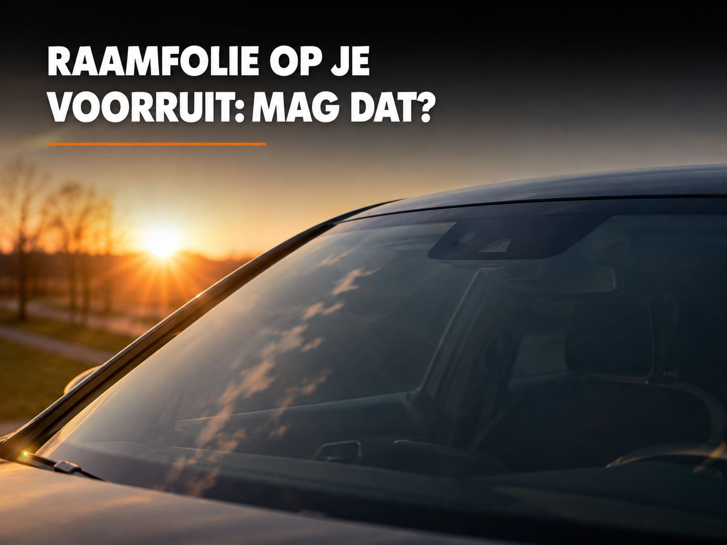 Raamfolie op de voorruit van een auto bij zonsondergang