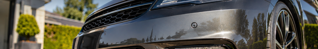 Carrosserie & Bumpers banner - close-up van een glanzende voorbumper | VCTparts