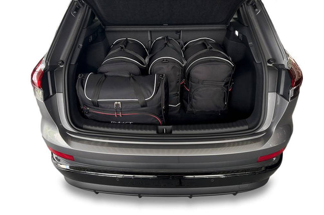 Kjust Kjust Reistassenset voor Audi Q4 e-tron vanaf 2021 - Set van 5 Tassen met 2 Roltassen 1 Sporttas en 2 Vliegtuigtassen Harvest Automotive 2