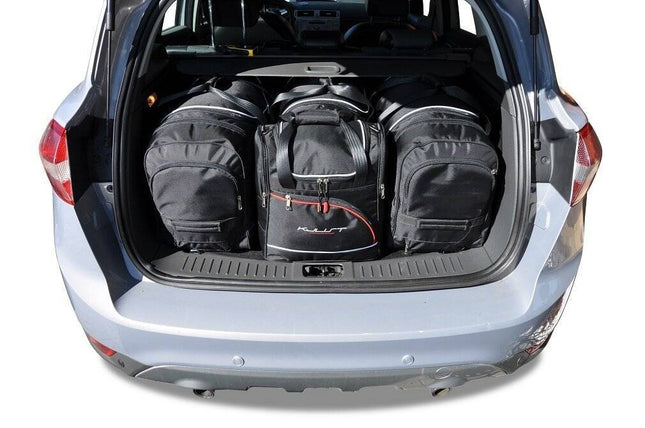 Kjust Kjust Reistassenset voor Ford Kuga 2008-2013 - Set van 4 Tassen met 2 Roltassen 1 Sporttas en 1 Vliegtuigtas Harvest Automotive 1