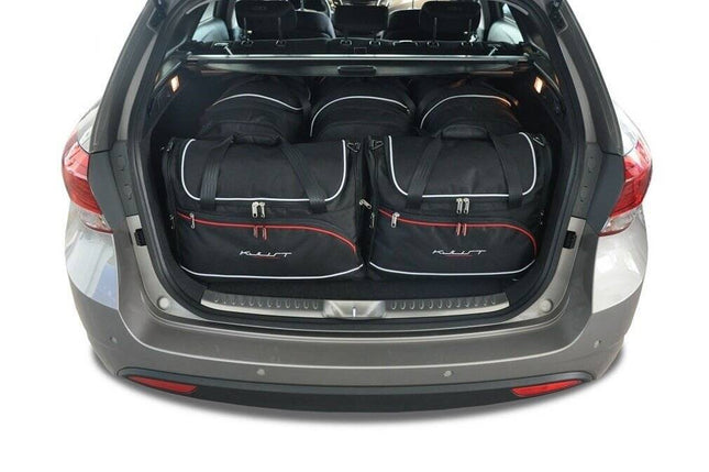 Kjust Kjust Reistassenset voor Hyundai i40 Tourer vanaf 2011 - Set van 5 Tassen met 3 Roltassen en 2 Vliegtuigtassen Harvest Automotive 1