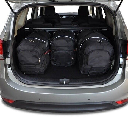 Kjust Kjust Reistassenset voor Kia Carens vanaf 2013 - Set van 4 Tassen met 3 Roltassen en 1 Sporttas Harvest Automotive 2