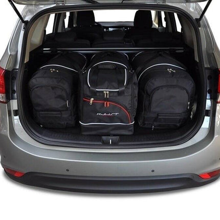 Kjust Kjust Reistassenset voor Kia Carens vanaf 2013 - Set van 4 Tassen met 3 Roltassen en 1 Sporttas Harvest Automotive 1