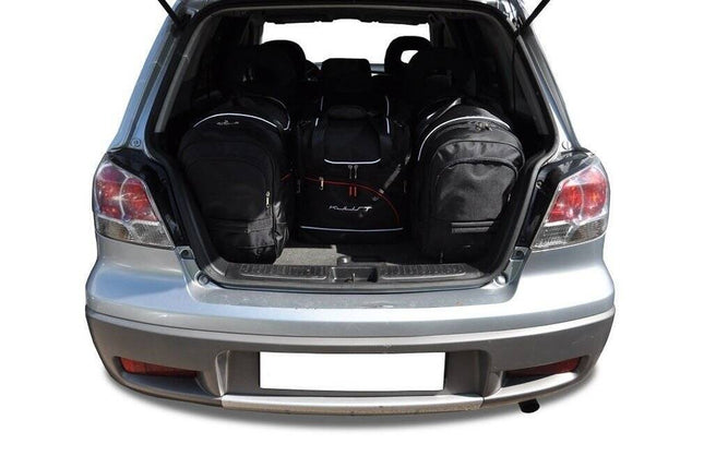 Kjust Kjust Reistassenset voor Mitsubishi Outlander 2003-2007 - Set van 5 Tassen met 2 Roltassen 1 Sporttas en 2 Vliegtuigtassen Harvest Automotive 2