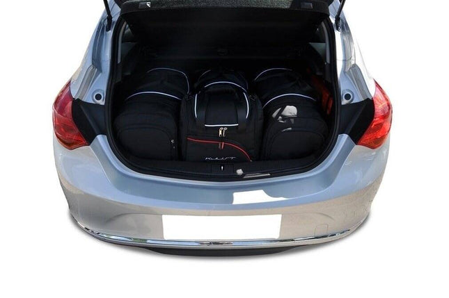 Kjust Kjust Reistassenset voor Opel Astra 5-deurs 2009-2015 - Set van 4 Tassen met 2 Roltassen en 2 Sporttassen Harvest Automotive 1