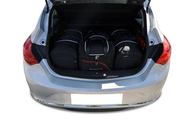 Kjust Reistassenset voor Opel Astra 5-deurs 2009-2015 - Set van 4 Tassen met 2 Roltassen en 2 Sporttassen