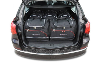 Kjust Reistassenset voor Opel Astra Sports Tourer 2010-2015 - Set van 5 Tassen met 3 Roltassen en 2 Vliegtuigtassen