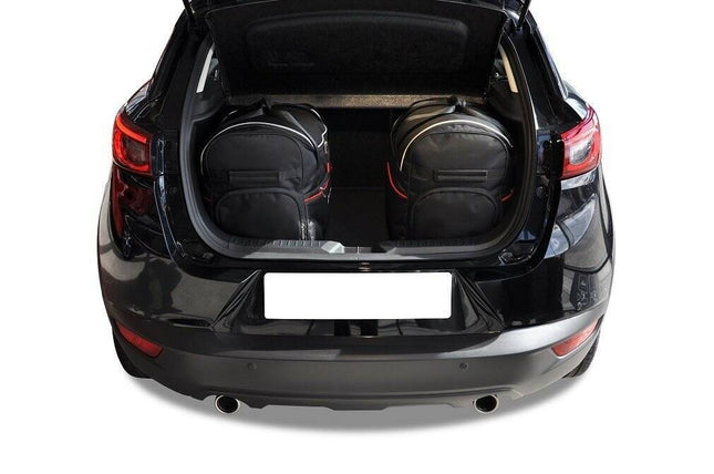 Kjust Reistassenset voor Mazda CX-3 vanaf 2015 - Set van 3 Tassen met 2 Roltassen en 1 Sporttas