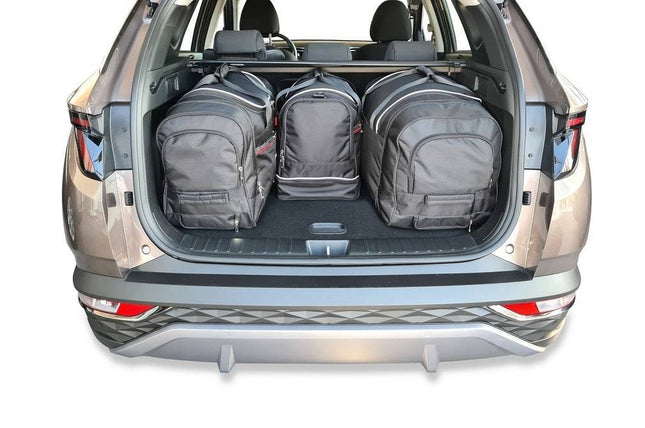 Kjust Reistassenset voor Hyundai Tucson vanaf 2020 - Set van 4 Tassen met 2 Roltassen 1 Sporttas en 1 Vliegtuigtas