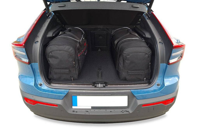 Kjust Reistassenset voor Volvo C40 2022-2024 - Set van 4 Tassen met 2 Roltassen en 2 Sporttassen