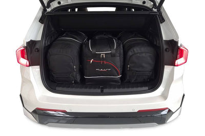 Kjust Reistassenset voor BMW X1 vanaf 2022 - Set van 4 Tassen met 2 Roltassen en 2 Sporttassen