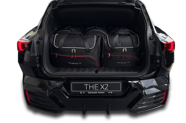 Kjust Reistassenset voor BMW iX2 vanaf 2023 - Set van 5 Tassen met 3 Roltassen en 2 Vliegtuigtassen
